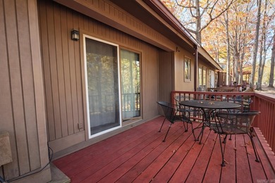 This 2-bedroom, 1.5-bath condo is tucked among mature trees and on DeSoto Golf Course in Arkansas - for sale on GolfHomes.com, golf home, golf lot