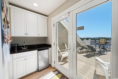 Enjoy breathtaking panoramic views of the marsh, estuary, and on DeBordieu Country Club in South Carolina - for sale on GolfHomes.com, golf home, golf lot