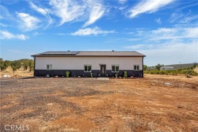 Welcome to this stunning 3-bedroom, 2-bathroom one-of-a-kind on Hidden Valley Lake Golf and Country Club in California - for sale on GolfHomes.com, golf home, golf lot