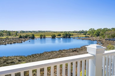 Enjoy breathtaking panoramic views of the marsh, estuary, and on DeBordieu Country Club in South Carolina - for sale on GolfHomes.com, golf home, golf lot