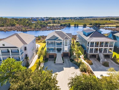 Enjoy breathtaking panoramic views of the marsh, estuary, and on DeBordieu Country Club in South Carolina - for sale on GolfHomes.com, golf home, golf lot