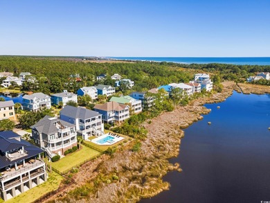 Enjoy breathtaking panoramic views of the marsh, estuary, and on DeBordieu Country Club in South Carolina - for sale on GolfHomes.com, golf home, golf lot