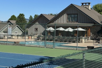 Enjoy breathtaking views of Flathead Lake and the iconic Mission on Polson Bay Golf Course - Championship Course in Montana - for sale on GolfHomes.com, golf home, golf lot