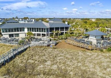 Enjoy breathtaking panoramic views of the marsh, estuary, and on DeBordieu Country Club in South Carolina - for sale on GolfHomes.com, golf home, golf lot