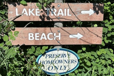 Enjoy breathtaking views of Flathead Lake and the iconic Mission on Polson Bay Golf Course - Championship Course in Montana - for sale on GolfHomes.com, golf home, golf lot