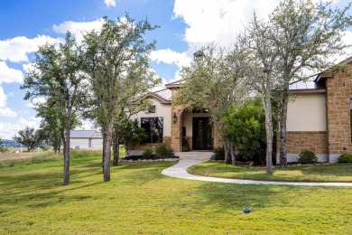 This beautiful Mediterranean home has a large open floor plan on The Club At Comanche Trace in Texas - for sale on GolfHomes.com, golf home, golf lot