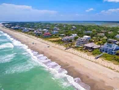 Enjoy breathtaking panoramic views of the marsh, estuary, and on DeBordieu Country Club in South Carolina - for sale on GolfHomes.com, golf home, golf lot