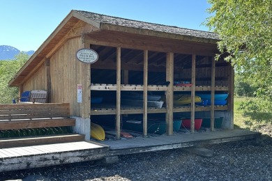 Enjoy breathtaking views of Flathead Lake and the iconic Mission on Polson Bay Golf Course - Championship Course in Montana - for sale on GolfHomes.com, golf home, golf lot