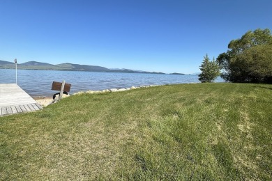 Enjoy breathtaking views of Flathead Lake and the iconic Mission on Polson Bay Golf Course - Championship Course in Montana - for sale on GolfHomes.com, golf home, golf lot