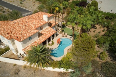 Southwest-inspired elegance meets luxury in this stunning on South Shore At Lake Las Vegas in Nevada - for sale on GolfHomes.com, golf home, golf lot