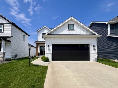 Welcome home to this 3 bedroom, 2.5 bath custom beauty sitting on The Legends of Champaign in Illinois - for sale on GolfHomes.com, golf home, golf lot