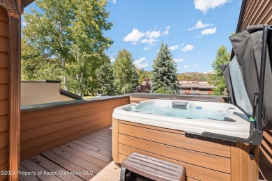 Renovated in 2023, this stunning Country Club Townhome boasts on The Snowmass Club in Colorado - for sale on GolfHomes.com, golf home, golf lot