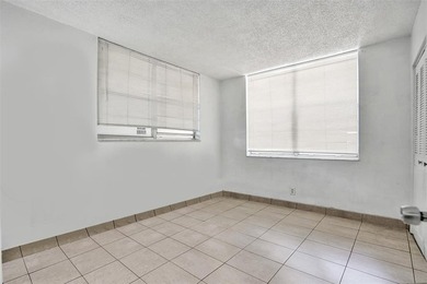 Spacious 2-Bedroom, 2-Bath Condo with Lake Views in Pine Island on Pine Island Ridge Country Club in Florida - for sale on GolfHomes.com, golf home, golf lot