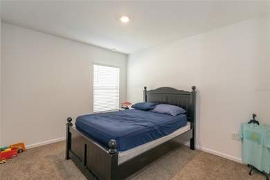 Welcome to this charming 4-bedroom, 2-bathroom home, built in on Grand Reserve Golf Course in Florida - for sale on GolfHomes.com, golf home, golf lot