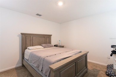 Welcome to this charming 4-bedroom, 2-bathroom home, built in on Grand Reserve Golf Course in Florida - for sale on GolfHomes.com, golf home, golf lot