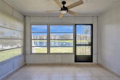 Spacious 2-Bedroom, 2-Bath Condo with Lake Views in Pine Island on Pine Island Ridge Country Club in Florida - for sale on GolfHomes.com, golf home, golf lot