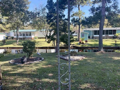 2 bedroom 2 bath renovated and very well maintained home located on Indigo Creek Golf Club in South Carolina - for sale on GolfHomes.com, golf home, golf lot