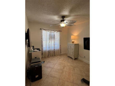 Lucky for you our buyer did not get financing so it's BACK ON on Palm-Aire Country Club and Resort - The Oaks in Florida - for sale on GolfHomes.com, golf home, golf lot