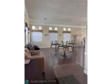 Wish you had a pool and a hot tub? Look no more! WELCOME to this on Palm-Aire Country Club and Resort - The Oaks in Florida - for sale on GolfHomes.com, golf home, golf lot