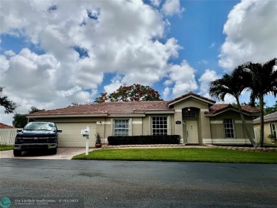 Wish you had a pool and a hot tub? Look no more! WELCOME to this on Palm-Aire Country Club and Resort - The Oaks in Florida - for sale on GolfHomes.com, golf home, golf lot