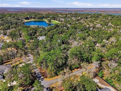 This impressive, one acre corner lot located in the desirable on The King and Prince Golf Course, Home of the Hampton Club in Georgia - for sale on GolfHomes.com, golf home, golf lot