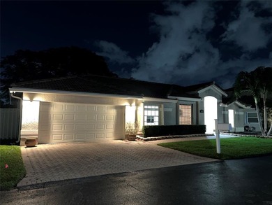 Wish you had a pool and a hot tub? Look no more! WELCOME to this on Palm-Aire Country Club and Resort - The Oaks in Florida - for sale on GolfHomes.com, golf home, golf lot