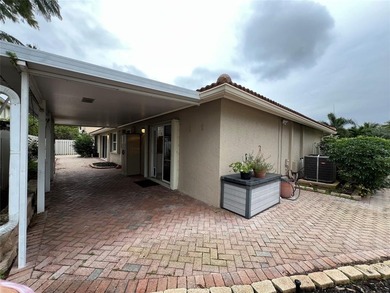 Wish you had a pool and a hot tub? Look no more! WELCOME to this on Palm-Aire Country Club and Resort - The Oaks in Florida - for sale on GolfHomes.com, golf home, golf lot