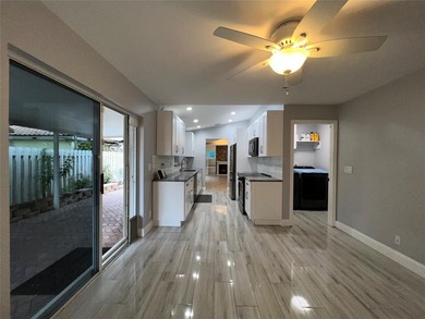 Wish you had a pool and a hot tub? Look no more! WELCOME to this on Palm-Aire Country Club and Resort - The Oaks in Florida - for sale on GolfHomes.com, golf home, golf lot