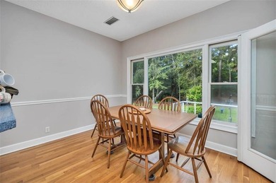 Tucked within the gated community of Oak Grove Island, 189 on Oak Grove Island Golf and Country Club in Georgia - for sale on GolfHomes.com, golf home, golf lot