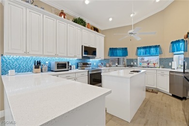 This beautifully updated home has been completely transformed on Sabal Springs Golf and Racquet Club in Florida - for sale on GolfHomes.com, golf home, golf lot