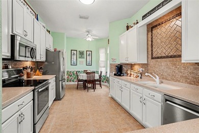 Experience EXCEPTIONAL Florida living in this Gorgeous golf on Tampa Bay Golf and Country Club in Florida - for sale on GolfHomes.com, golf home, golf lot