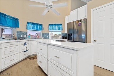 This beautifully updated home has been completely transformed on Sabal Springs Golf and Racquet Club in Florida - for sale on GolfHomes.com, golf home, golf lot