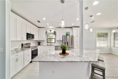 Sparkling POOL Home Located within the sought-after community of on Rainbow Springs Golf and Country Club in Florida - for sale on GolfHomes.com, golf home, golf lot