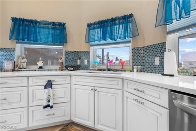 This beautifully updated home has been completely transformed on Sabal Springs Golf and Racquet Club in Florida - for sale on GolfHomes.com, golf home, golf lot