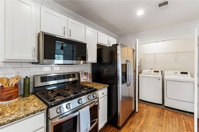 With one of the largest lots in the neighborhood, this cozy on East Lake Golf Club in Georgia - for sale on GolfHomes.com, golf home, golf lot