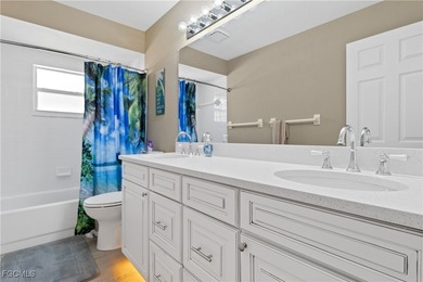 This beautifully updated home has been completely transformed on Sabal Springs Golf and Racquet Club in Florida - for sale on GolfHomes.com, golf home, golf lot
