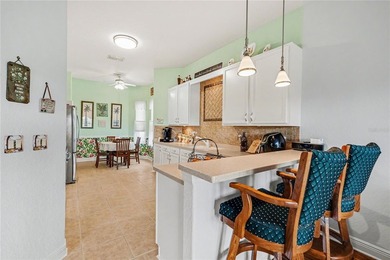 Experience EXCEPTIONAL Florida living in this Gorgeous golf on Tampa Bay Golf and Country Club in Florida - for sale on GolfHomes.com, golf home, golf lot