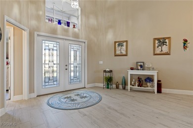 This beautifully updated home has been completely transformed on Sabal Springs Golf and Racquet Club in Florida - for sale on GolfHomes.com, golf home, golf lot