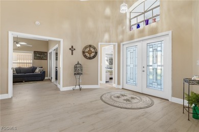 This beautifully updated home has been completely transformed on Sabal Springs Golf and Racquet Club in Florida - for sale on GolfHomes.com, golf home, golf lot