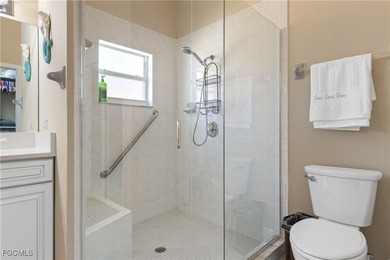 This beautifully updated home has been completely transformed on Sabal Springs Golf and Racquet Club in Florida - for sale on GolfHomes.com, golf home, golf lot