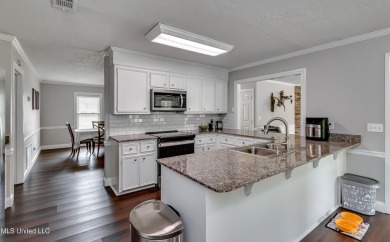 Beautifully maintained 4/3 home on sought after Deerfield Golf on Colonial Country Club Deerfield in Mississippi - for sale on GolfHomes.com, golf home, golf lot