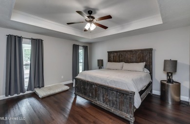 Beautifully maintained 4/3 home on sought after Deerfield Golf on Colonial Country Club Deerfield in Mississippi - for sale on GolfHomes.com, golf home, golf lot