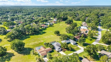 Sparkling POOL Home Located within the sought-after community of on Rainbow Springs Golf and Country Club in Florida - for sale on GolfHomes.com, golf home, golf lot
