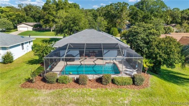 Sparkling POOL Home Located within the sought-after community of on Rainbow Springs Golf and Country Club in Florida - for sale on GolfHomes.com, golf home, golf lot