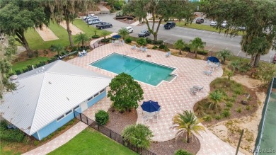 Sparkling POOL Home Located within the sought-after community of on Rainbow Springs Golf and Country Club in Florida - for sale on GolfHomes.com, golf home, golf lot