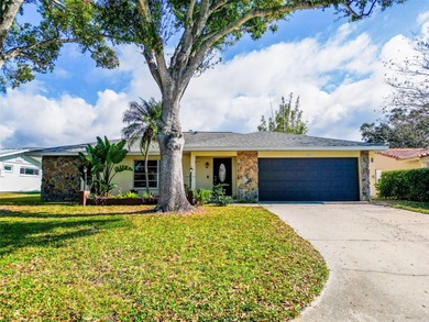 Charming 3BR/2BA/2-Car Garage Home on a Quiet Cul-de-Sac in on The Dunedin Country Club in Florida - for sale on GolfHomes.com, golf home, golf lot