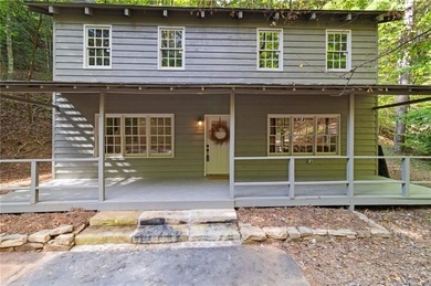 Welcome to charming *Creekside Cabin* tucked away in the on Big Canoe Golf Club - Cherokee in Georgia - for sale on GolfHomes.com, golf home, golf lot