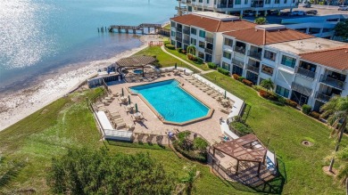 Enjoy panoramic vistas of the glistening bay from your private on Isla Del Sol Yacht and Country Club in Florida - for sale on GolfHomes.com, golf home, golf lot