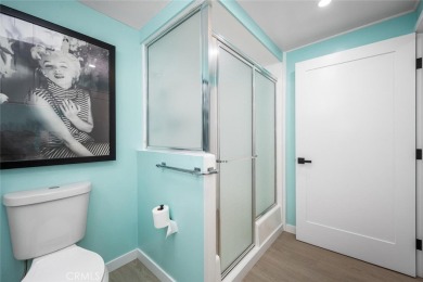 Discover the perfect blend of modern comfort and natural beauty on Leisure World Seal Beach Golf Course in California - for sale on GolfHomes.com, golf home, golf lot