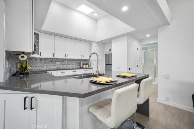 Discover the perfect blend of modern comfort and natural beauty on Leisure World Seal Beach Golf Course in California - for sale on GolfHomes.com, golf home, golf lot